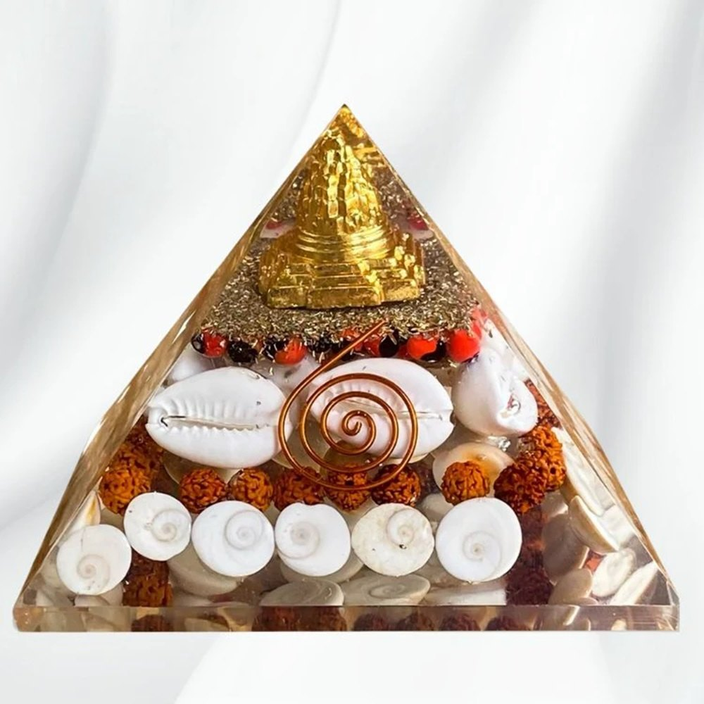 Dhan Laxmi pyramid with gold leaf, rudraksha and cowrie shells
